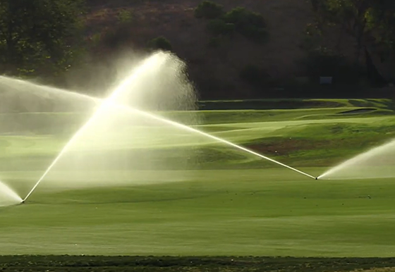 Hunter TTS800 golf rotors spraying a golf course