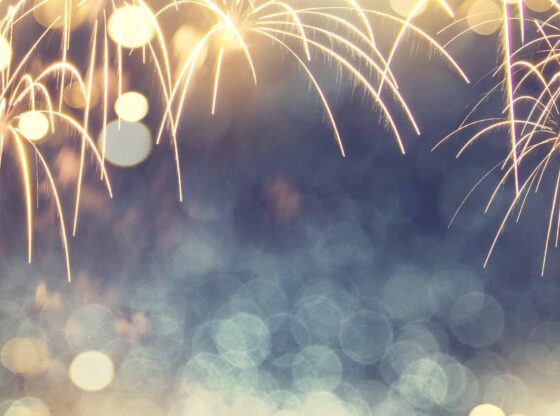 This is the featured image for this article showing fireworks in bokeh.