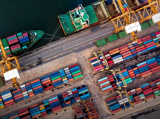 This is an aerial view of a dock with shipping containers.